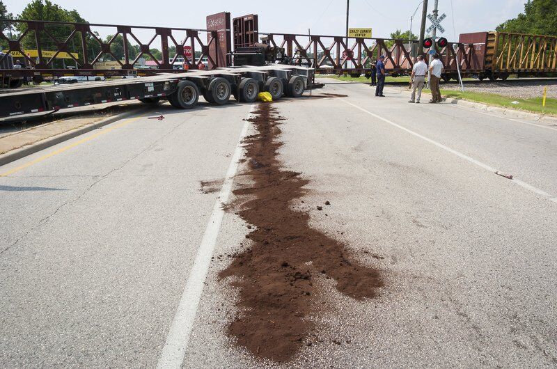Train collides with semi at Crazy Corner; traffic tangled